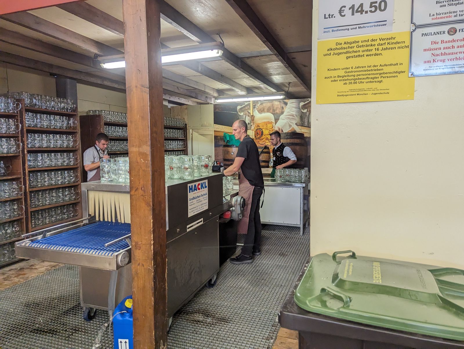 Beer counter in the Paulaner Festzelt with a Maß price board reading Ltr. €14.50