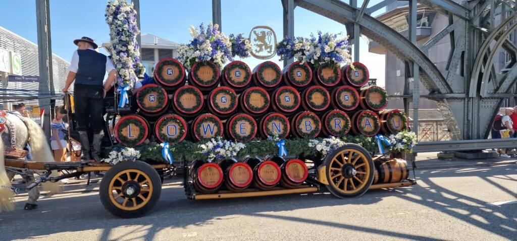 Löwenbräu horse-drawn barrel float in the Oktoberfest opening day parade at Theresienwiese