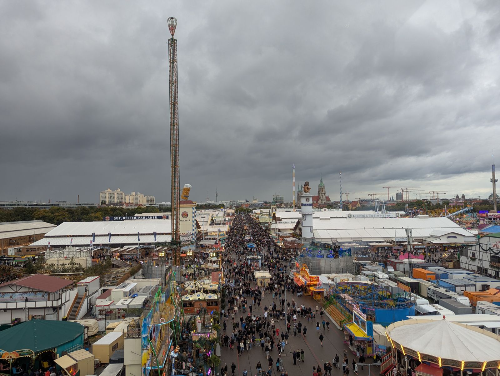Aerial view down the main avenue of the Oktoberfest grounds packed with visitors